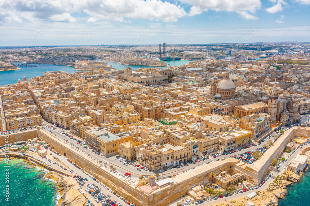 Obraz premium Aerial panoramic cityscape view of Lady of Mount Carmel church, St.Paul's Cathedral in Valletta city center, Malta.