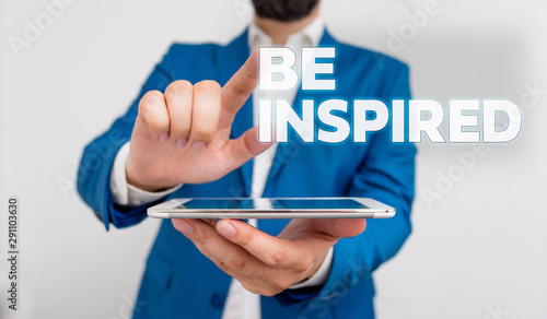 Word writing text Be Inspired. Business photo showcasing extraordinary quality as arising from some creative impulse Businessman with pointing finger in front of him
