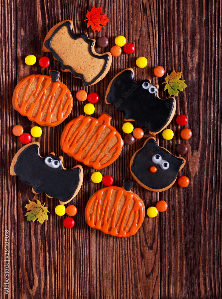 Halloween cookies over dark wooden background Halloween cookies over dark wooden background