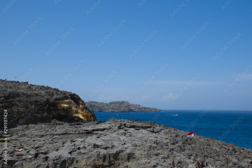 Beautiful rock cliff with blue sea in Nusa Penida Island Bali, Indonesia