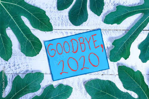 Writing note showing Goodbye 2020. Business concept for New Year Eve Milestone Last Month Celebration Transition photo