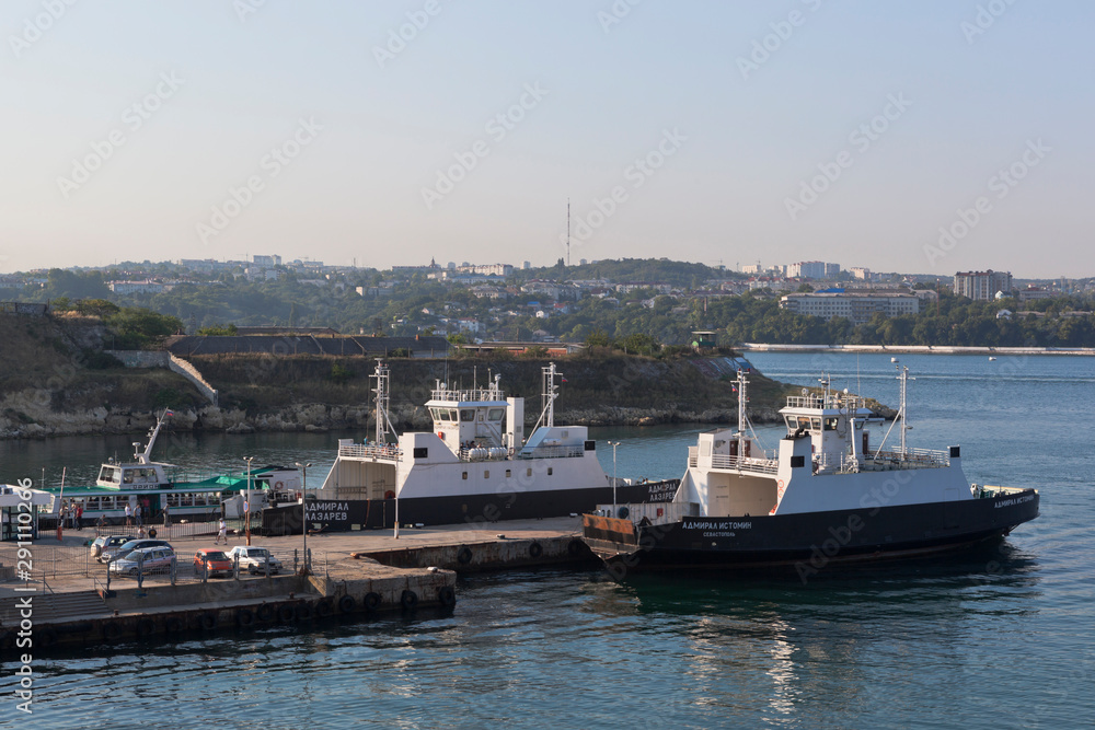 Admiral Lazarev and Admiral Istomin ferries at berth No. 11 in the bay of the Northern city of Sevastopol, Crimea