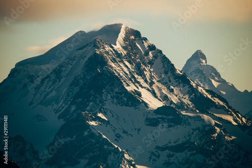 View from Aiguille du Midi, France. Skiers going down on Mer de Glace .