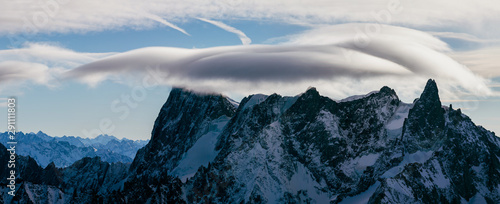 View from Aiguille du Midi, France. Skiers going down on Mer de Glace .