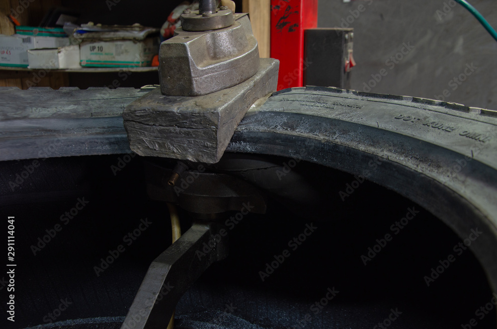 work of the master on tire fitting equipment work of the master on tire fitting equipment