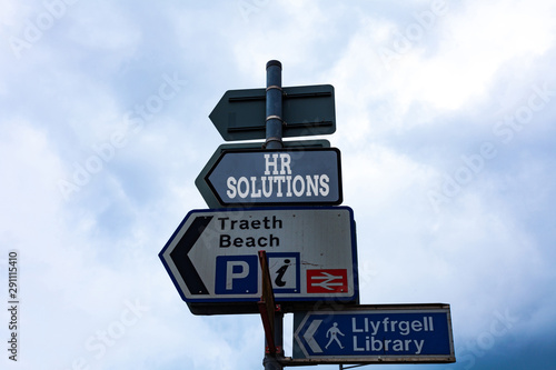 Text sign showing Hr Solutions. Business photo text Outsourced Huanalysis resources consultancy and support Experts Empty street signs on the crossroads with blank copy space