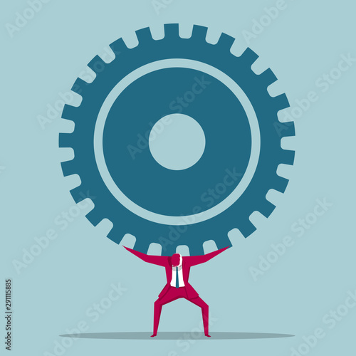 Businessman carrying huge gears. Isolated on blue background.