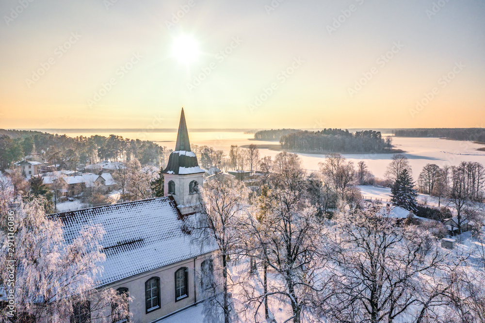 Fototapeta premium Aerial view of the church in winter