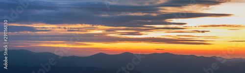 View of dramatic Carpathian mountains sky with colorful clouds and beautiful scenery