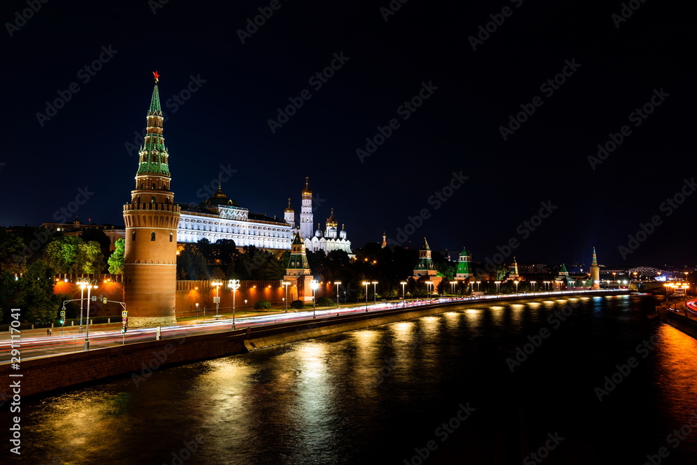 Illuminated Moscow Kremlin, Kremlin Embankment and Moscow River at night in Moscow, Russia.