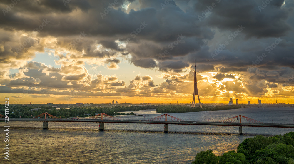 Beautiful dramatic sunset over the Riga city