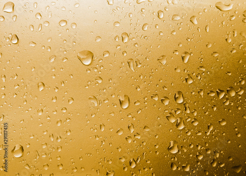 Gold drops abstract background, metallic color