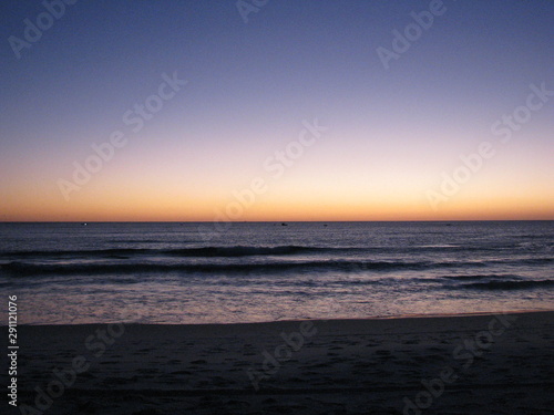 Sunset at Big Beach (Praia Grande) - Rio de Janeiro - Brazil - Please note that although the coast of Brazil is east, on this beach the sunset, which is in the west, occurs in the sea. © Vlad Loschi