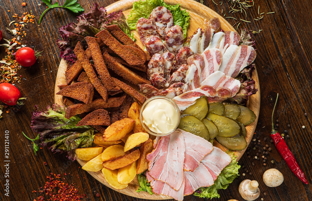 meat appetizers on the wooden background meat appetizers on the wooden background