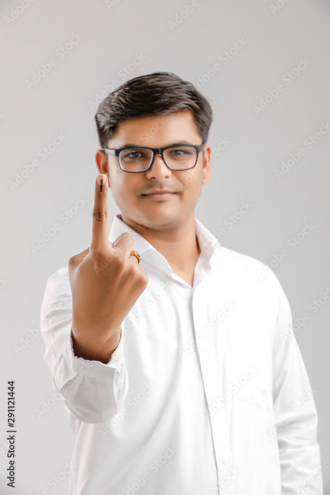 Young Indian voter showing finger Young Indian voter showing finger