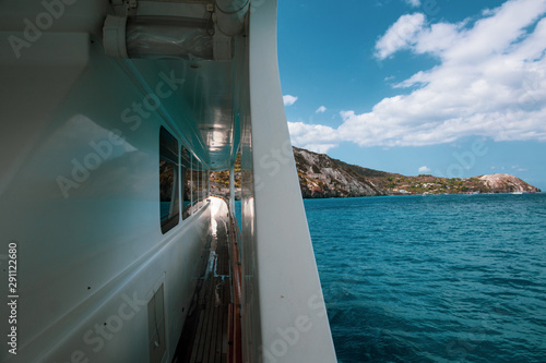 View of the turquoise Mediterranean Sea and Lipari, in the Aeolian Islands, from a luxury private yacht.