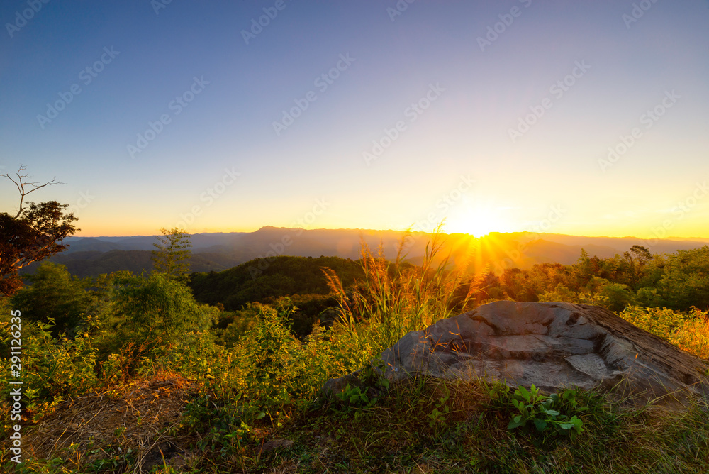 Landscape of Sun rise or sunset during the sun between sky and land that have lens flare