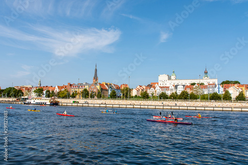 people sailing on kayaks in the city of szczecin