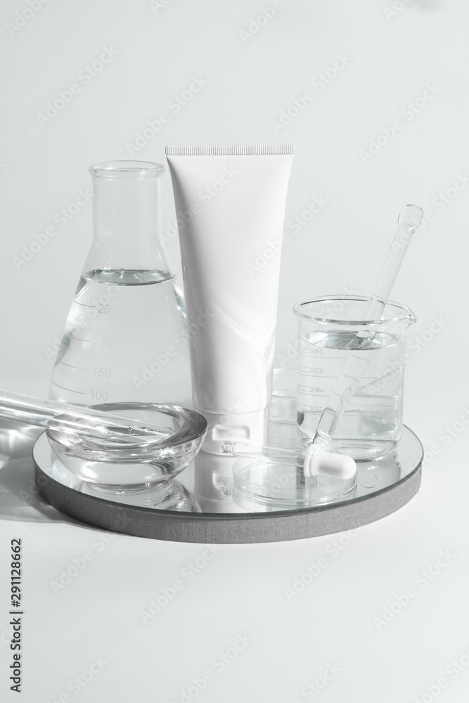beauty spa medical skincare and cosmetic lotion bottle cream packaging product on white decor background and laboratory test glass tube in doctor healthy science concept beauty spa medical skincare and cosmetic lotion bottle cream packaging product on white decor background and laboratory test glass tube in doctor healthy science concept