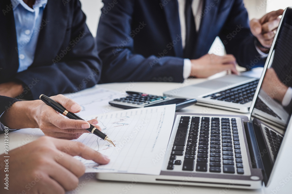 Business team investment working with computer and analysis graph stock market trading with stock chart data, business and technology concept Business team investment working with computer and analysis graph stock market trading with stock chart data, business and technology concept