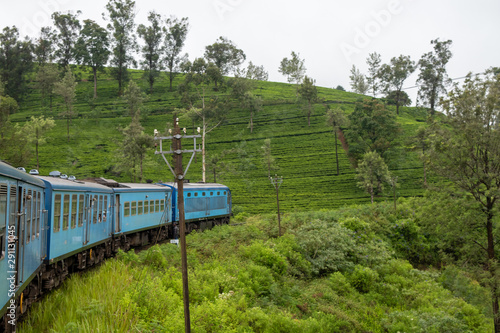 Sri Lankan train from Ella to Kendy. Surrounded by nature, tea plantations and foods.