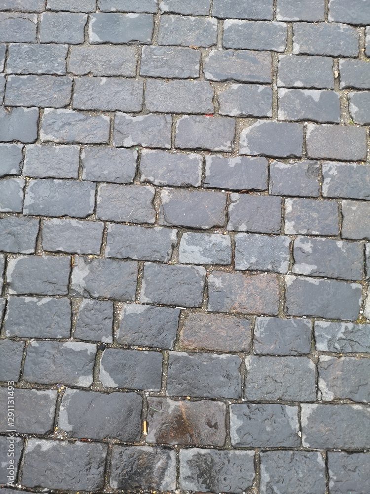 Stone pavers on red square
