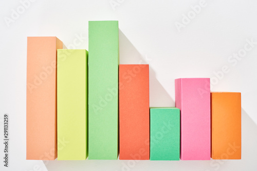 top view of multicolor analytical graph on white background