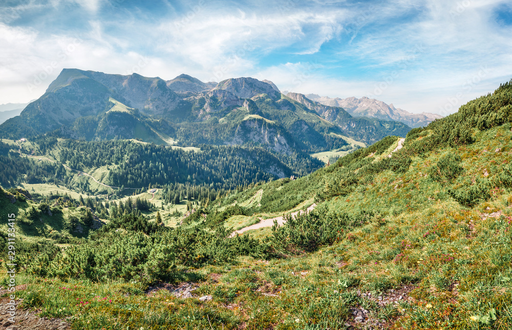 Amazing view from top of cableway above the Konigsee lake on Schneibstein mountain ridge. Bright summer morning on a border of Germany and Austrian Alps. Berchtesgaden location, Bavaria, Germany.
