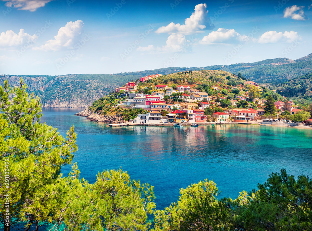 Impressive morning cityscape of Asos village on the west coast of the island of Cephalonia, Greece, Europe. Colorful spring sescape of Ionian Sea. Traveling concept background.