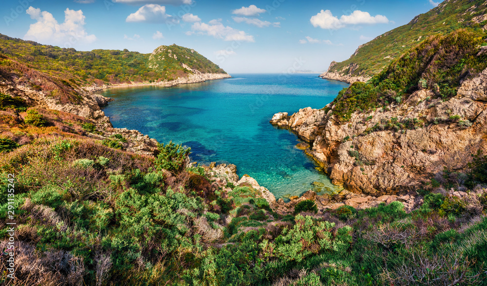 Sunny spring view of Pirates Bay, Porto Timoni, Afionas village location. Beautiful morning seascape of Ionian Sea. Fantastic outdoor scene of Corfu island, Greece, Europe. Sunny spring view of Pirates Bay, Porto Timoni, Afionas village location. Beautiful morning seascape of Ionian Sea. Fantastic outdoor scene of Corfu island, Greece, Europe.