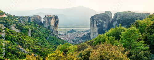 Panoramic view of famous Eastern Orthodox monasteries listed as a World Heritage site, built on top of rock pillars. Beautiful spring scene of Kalabaka location, part of Thessaly, Greece.