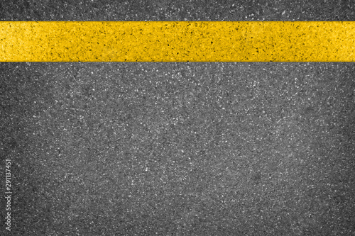 Yellow line on road texture © tusumaru