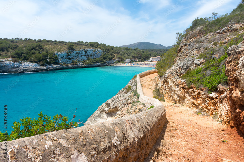 Hiking trail along the Bay of Cala Romantica in Mallorca.