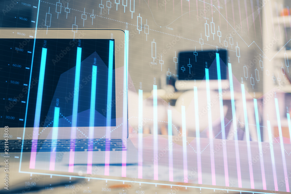 Forex Chart hologram on table with computer background. Double exposure. Concept of financial markets. Forex Chart hologram on table with computer background. Double exposure. Concept of financial markets.