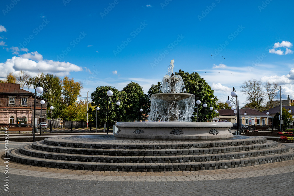 autumn, clear, day, blue, sky, clouds, space, city, street, square, paths, lights, benches, houses, buildings, fountain, jets, water, trees, recreation, travel, walk, admiring, observation