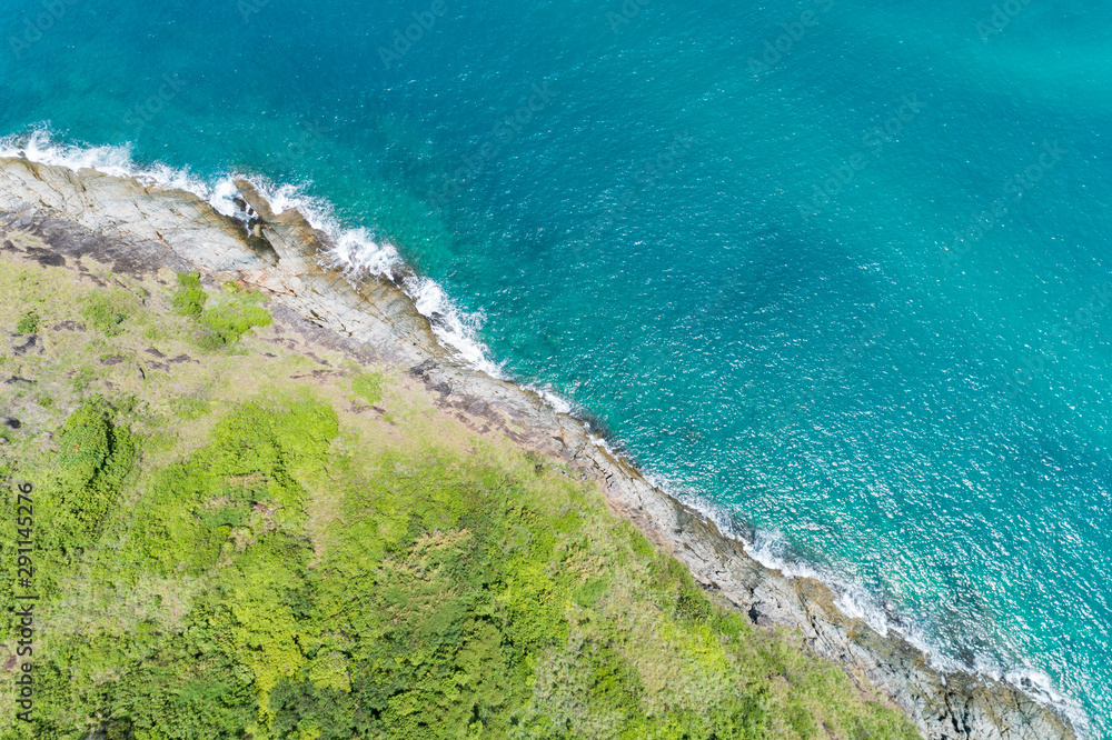 Aerial view of crashing waves on rocks landscape nature view and Beautiful tropical sea with Sea coast view in summer season image by Aerial view drone high angle view