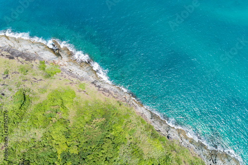 Aerial view of crashing waves on rocks landscape nature view and Beautiful tropical sea with Sea coast view in summer season image by Aerial view drone high angle view