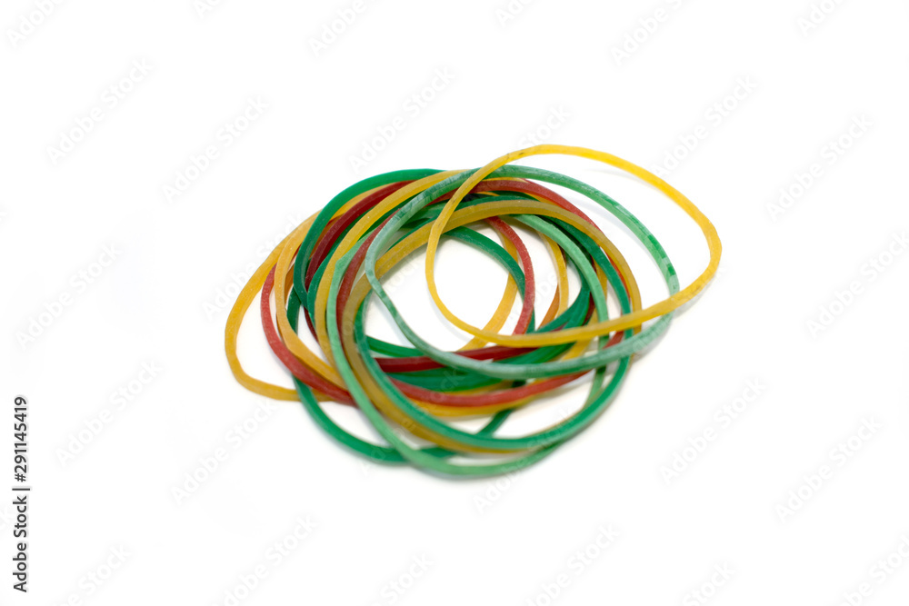 Photo of colored rubber bands for money, stationery on a white background.