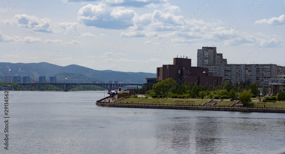 City landscape with river and cultural and historical center in the city of Krasnoyarsk Russia.