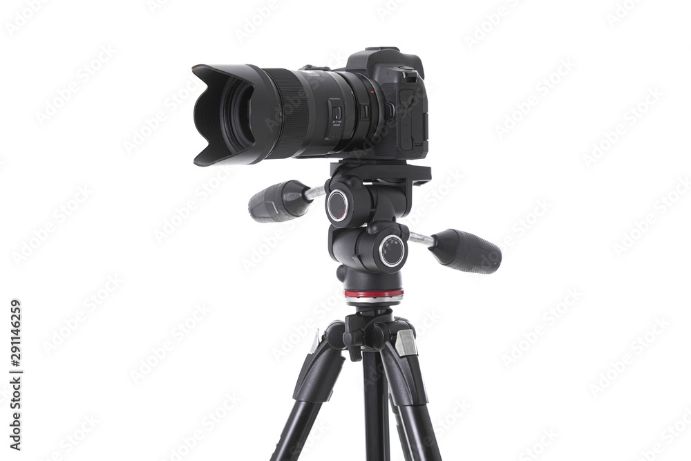 Side-view of professional camera device on tripod isolated