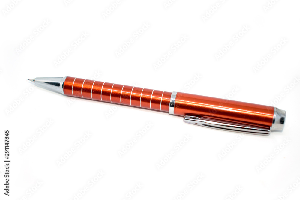 Photo of an automatic red pencil on a light background.