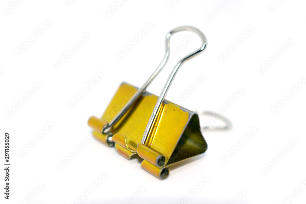 Photo of a yellow paper clip.