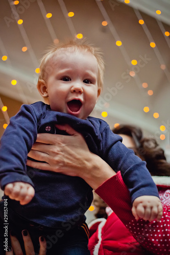 mother and son play at Christmas