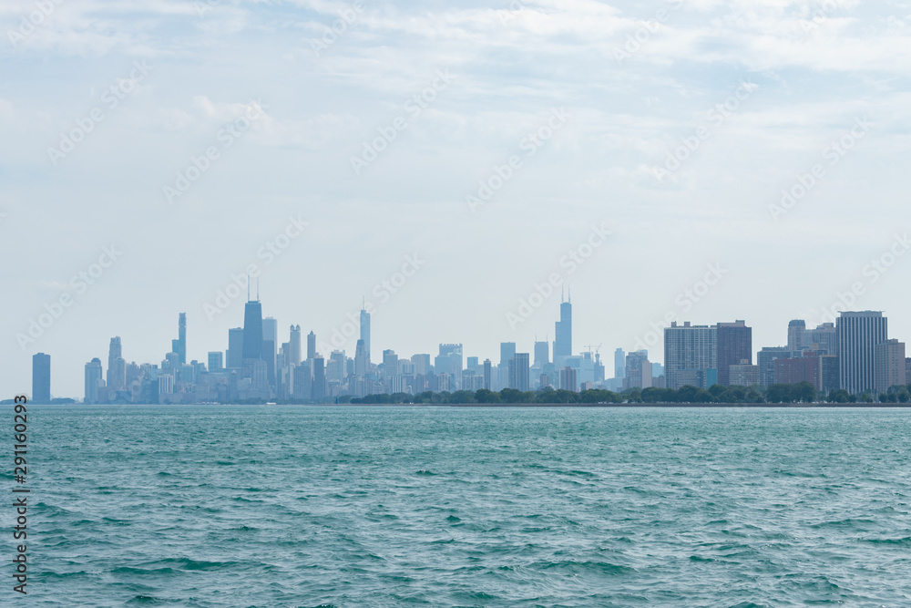 The Chicago Skyline and Lake Michigan in the Distance seen from Montrose Point The Chicago Skyline and Lake Michigan in the Distance seen from Montrose Point