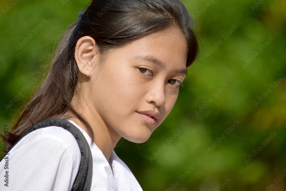 A Pretty Asian Female Student Outdoors A Pretty Asian Female Student Outdoors