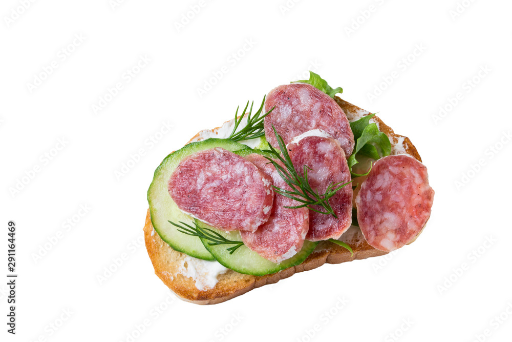 Sandwich with sausage, lettuce and cucumber isolated on a white background.