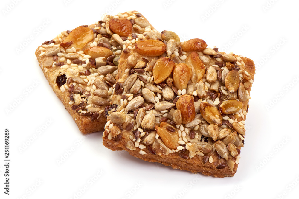 Cookies with nuts and seeds of peanut, sunflower seeds, sesame, linen, bio organic food, isolated on white background Cookies with nuts and seeds of peanut, sunflower seeds, sesame, linen, bio organic food, isolated on white background