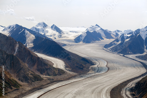 The Kaskawulsh Glacier flows between the mountains in Kluane National Park, Yukon, Canada
