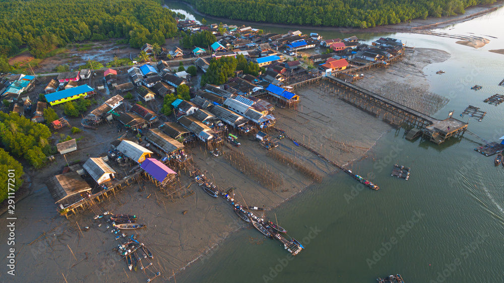 Fototapeta premium during low tide fishing boats stuck on the mud in Ban Sam Chong fishing village