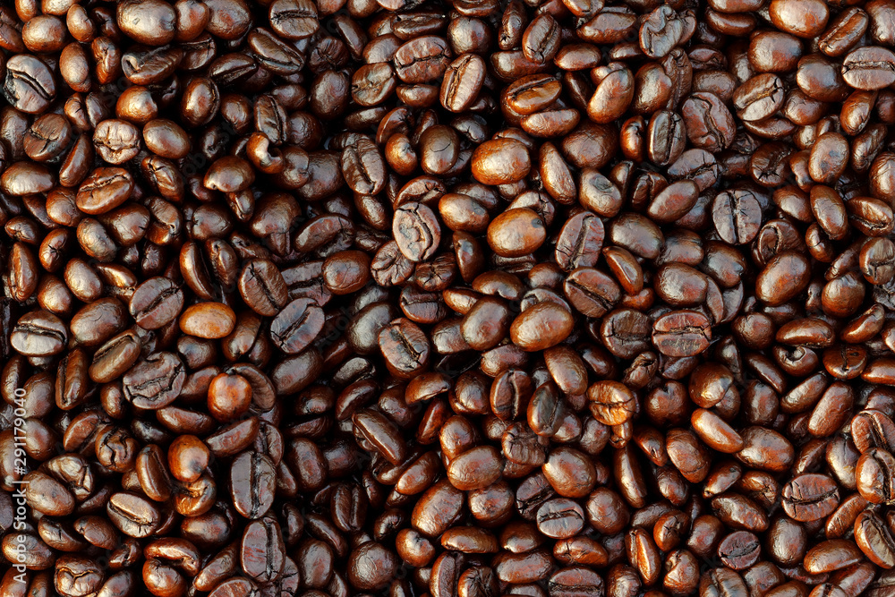 Brown roasted coffee beans background Brown roasted coffee beans background